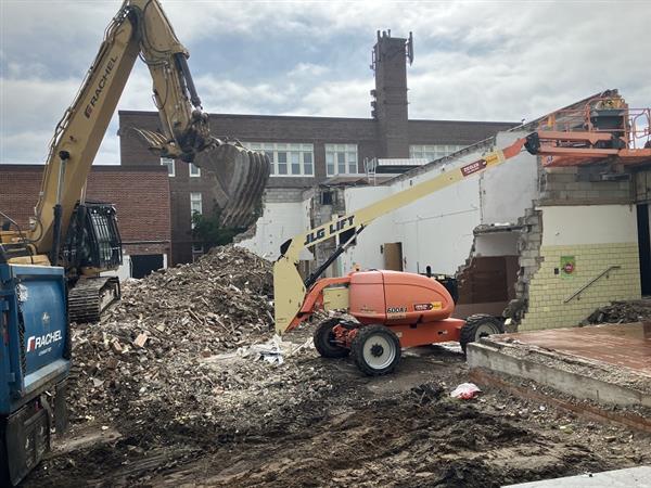 Former cafeteria being demolished to clear space for new construction 